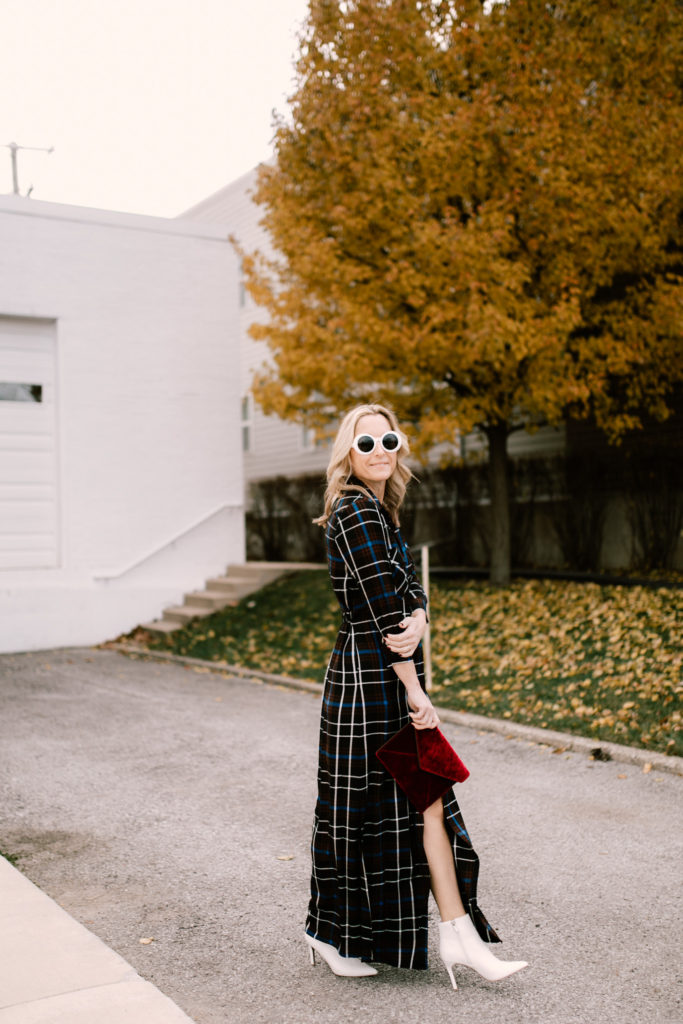 woman sharing how to wear a plaid maxi dress  and sunglasses 