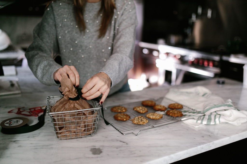 woman wrapping cookies 