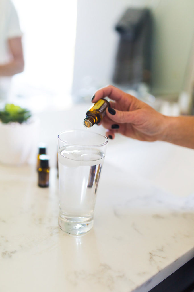 Adding Essential Oil Lemon to Water