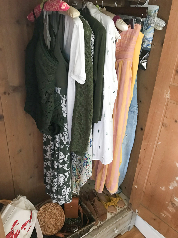 Closet filled with marigold and moss green clothing items for What To Wear in Hawaii