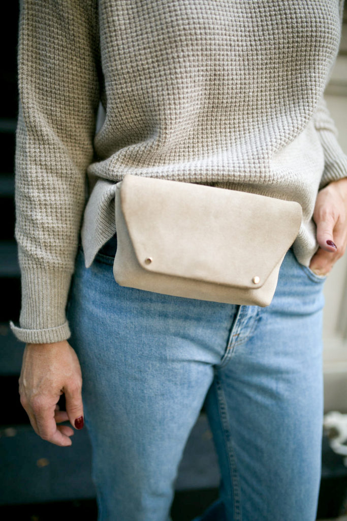 Cashmere sweater and belt bag in oatmeal