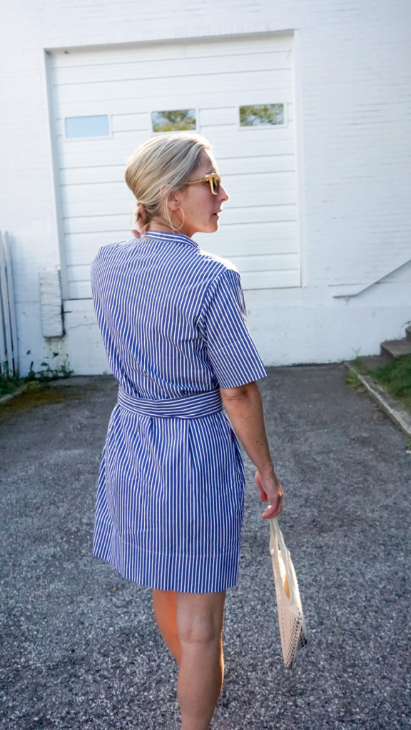 An Everlane Favorite is a stylish shirtdress, as seen here from the back